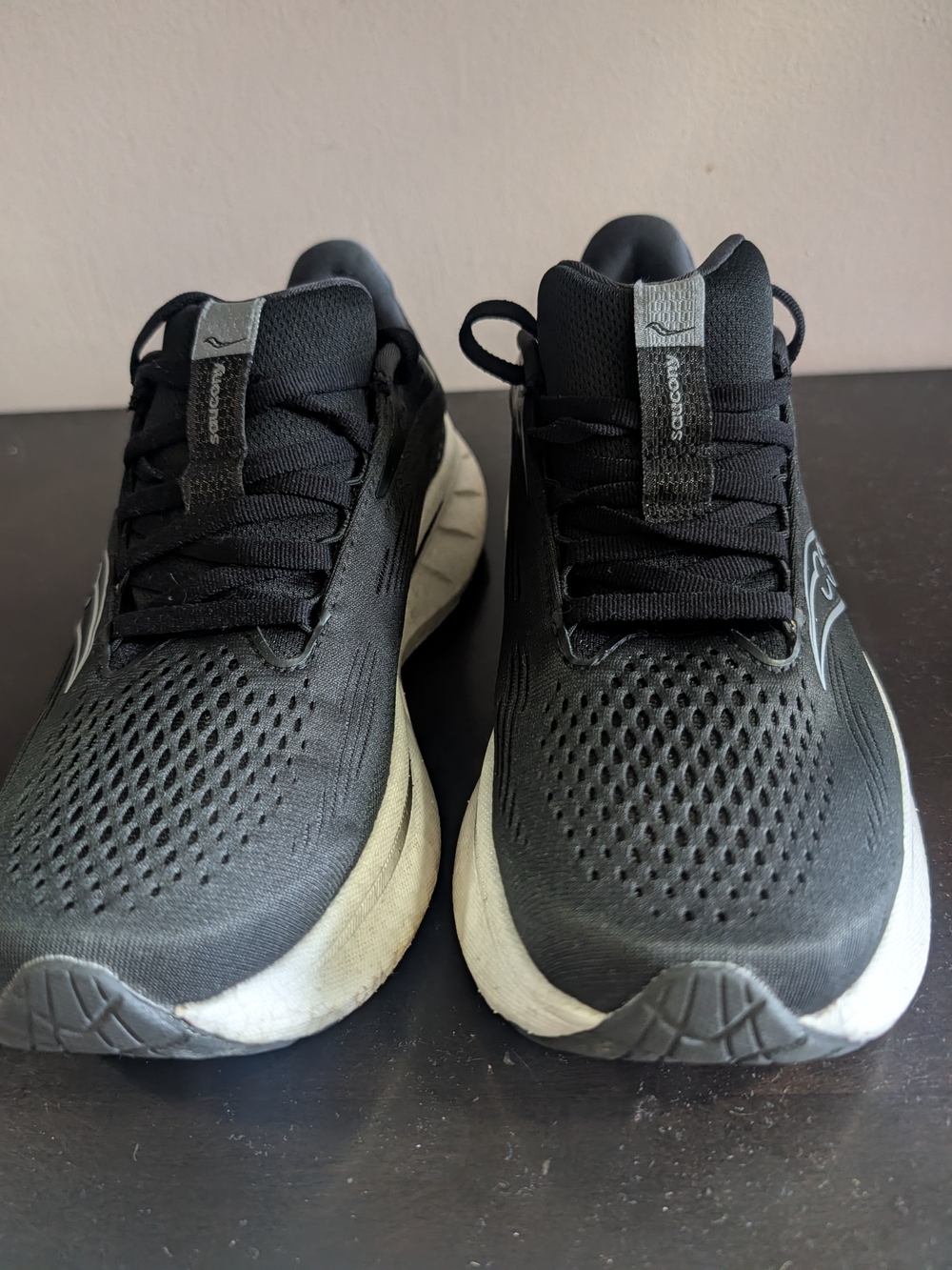 Saucony Black Athletic Running Shoes with White Midsole